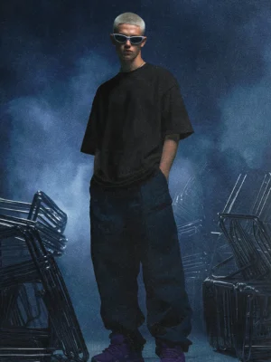 Model wearing black oversized T-shirt